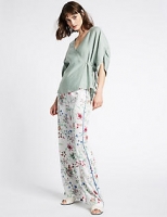 Marks and Spencer  Floral Print Tapered Leg Trousers