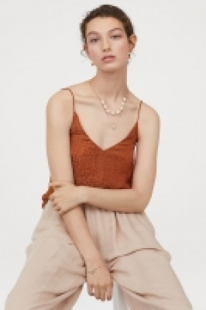  V-neck strappy top 7.00 €