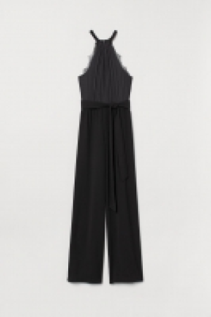  Jumpsuit with a tie belt 34.00 €