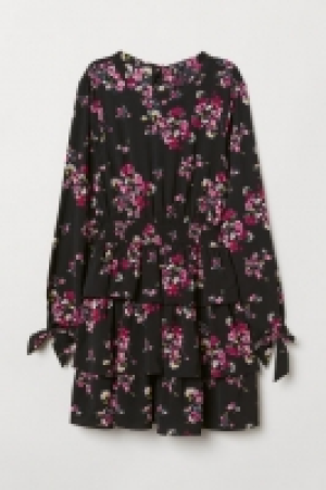  Patterned dress 25.00 €