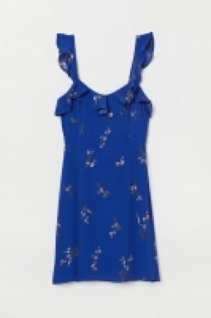  Dress with flounces 22.00 €