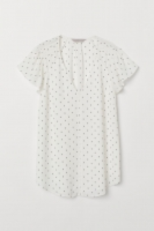 Flounce-sleeved top 13.00 €