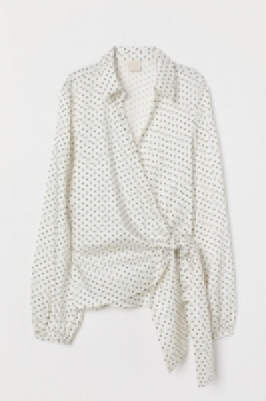  Wrapover blouse with ties 18.00 €