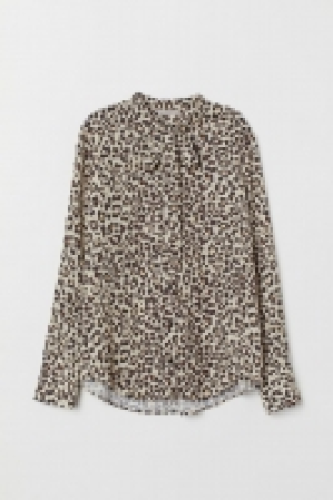  Blouse with ties 17.00 €