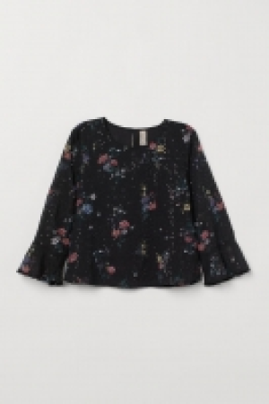  Flounce-sleeved blouse 20.00 €