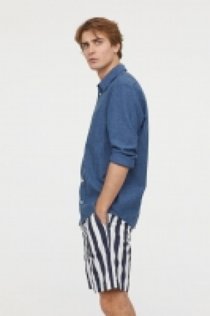  Elasticated cotton shorts 11.00 €