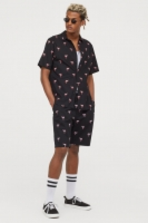  Elasticated cotton shorts 10.00 €