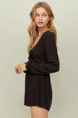  Playsuit with knot detail 18.00 €