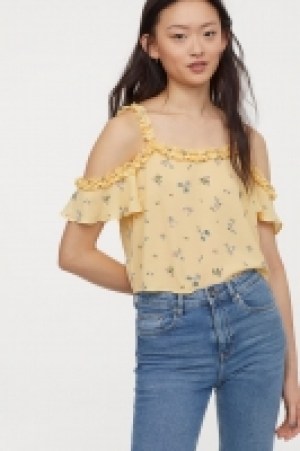  Short cold shoulder top 13.00 €