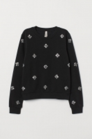  Sweatshirt with appliqués 23.00 €