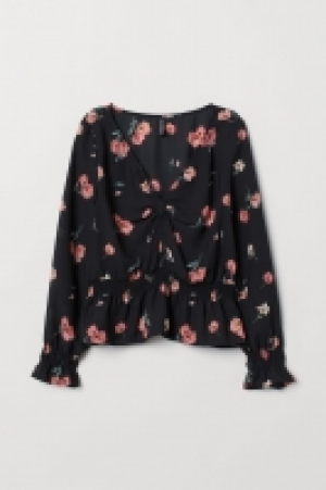  Knot-detail blouse 10.00 €