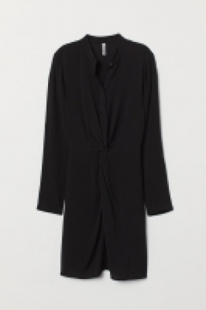  Dress with a knot detail 13.00 €