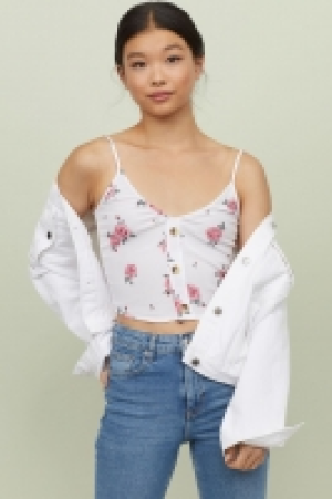  Short strappy top 9.00 €