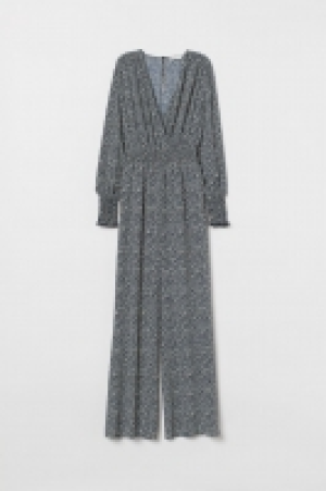  Jumpsuit with smocking 22.00 €