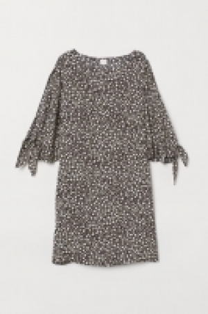  Tie-sleeved dress 6.00 €
