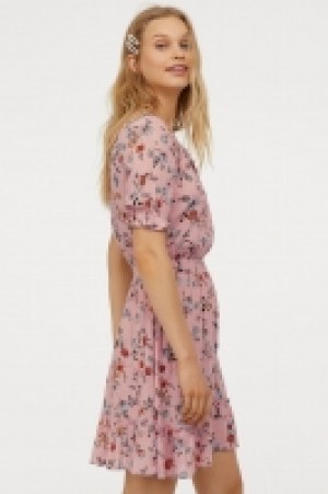 Glittery, frilled dress 13.00 €