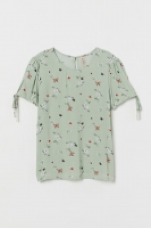  Short-sleeved blouse 6.00 €