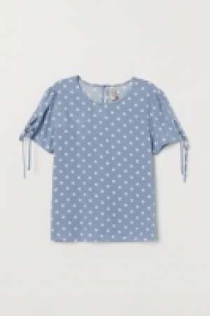  Short-sleeved blouse 7.00 €
