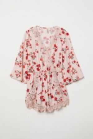  Playsuit with lace 18.00 €
