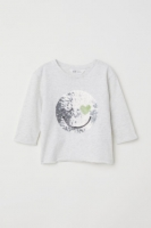  Jersey top with sequins 2.00 €