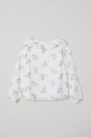  Blouse with a frilled collar 4.00 €