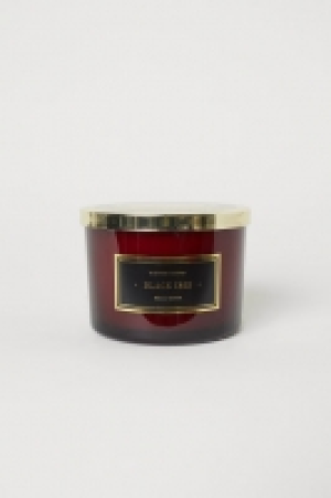  Scented candle in glass holder 9.00 €