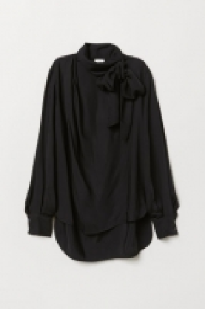  Blouse with ties 30.00 €