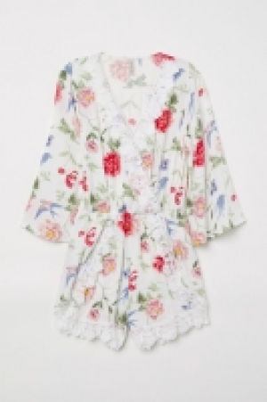  Playsuit with lace 16.00 €