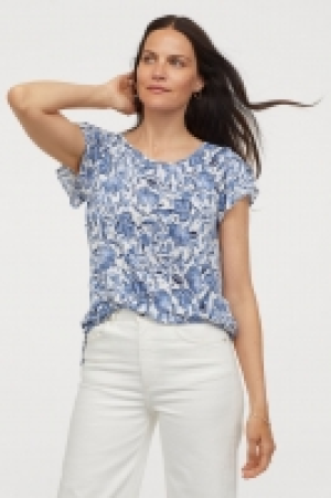  Flounce-sleeved top 5.00 €