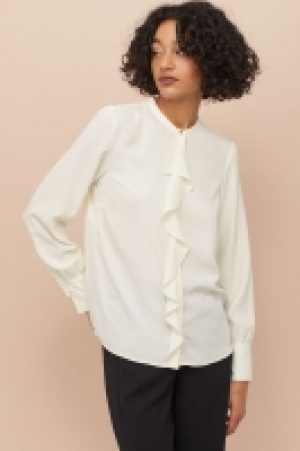  Flounced blouse 14.99 €