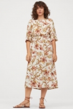  Dress with smocking 8.99 €