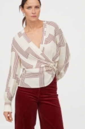  Knot-detail blouse 12.99 €