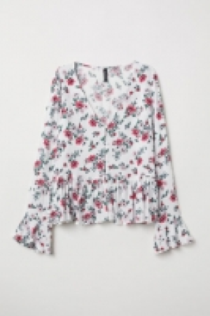  V-neck blouse with buttons 8.00 €