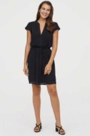  Dress with a tie belt 14.99 €