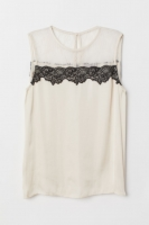  Blouse with a lace yoke 9.99 €