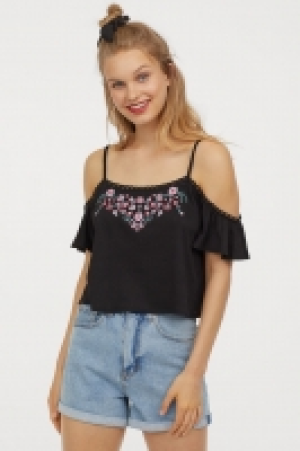  Embroidered cold shoulder top 9.00 €