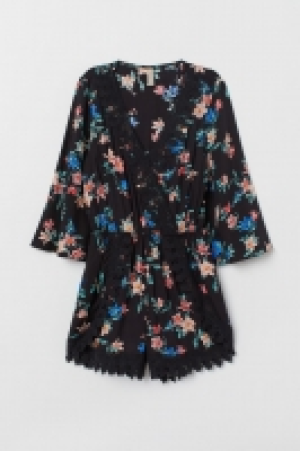  Playsuit with lace 15.00 €