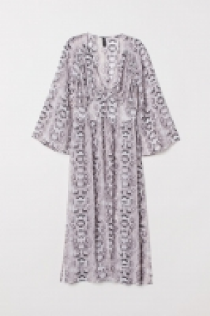  Long blouse with buttons 13.00 €