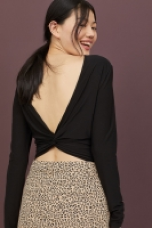  Top with a V-neck back 8.00 €