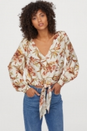  Patterned tie-hem blouse 9.99 €