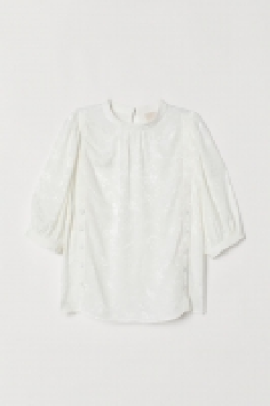  Puff-sleeved blouse 14.99 €