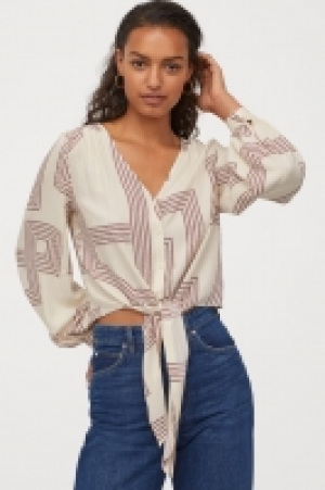  Patterned tie-hem blouse 12.99 €