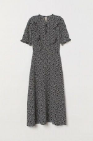  Flounced dress 15.00 €