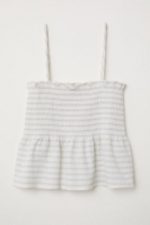  Peplum top with smocking 9.99 €