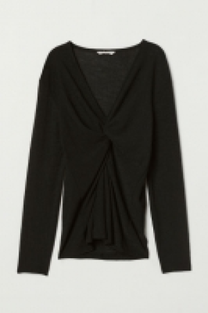  Top with a knot detail 14.99 €
