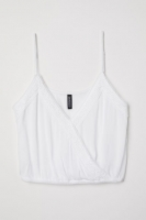  V-neck vest top with lace 5.00 €