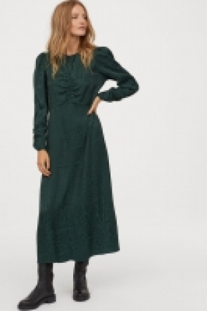  Jacquard-weave dress 24.99 €
