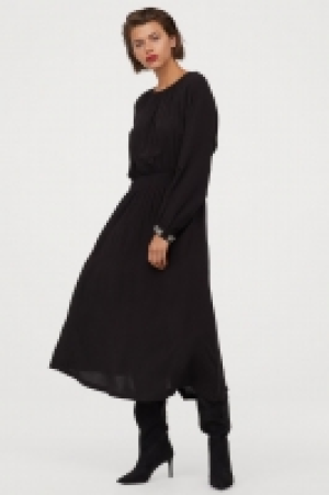  Dress with smocking 19.99 €