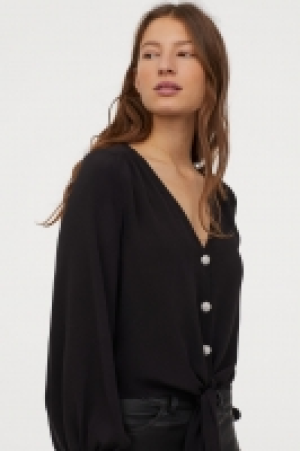  Tie-front V-neck blouse 17.99 €