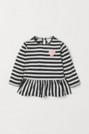  Top with a flounce 7.00 €